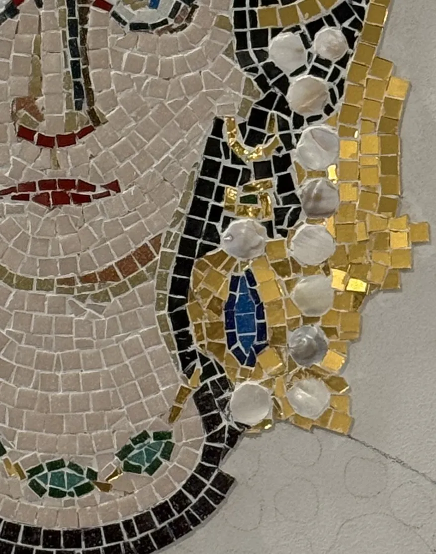 Upper portion of the mosaic with crown and halo.